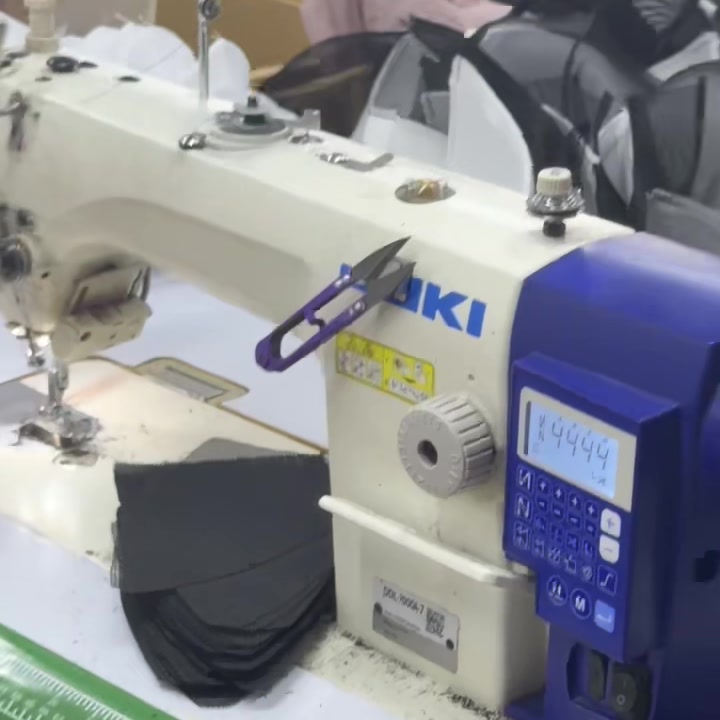 JUKI industrial sewing machine in operation